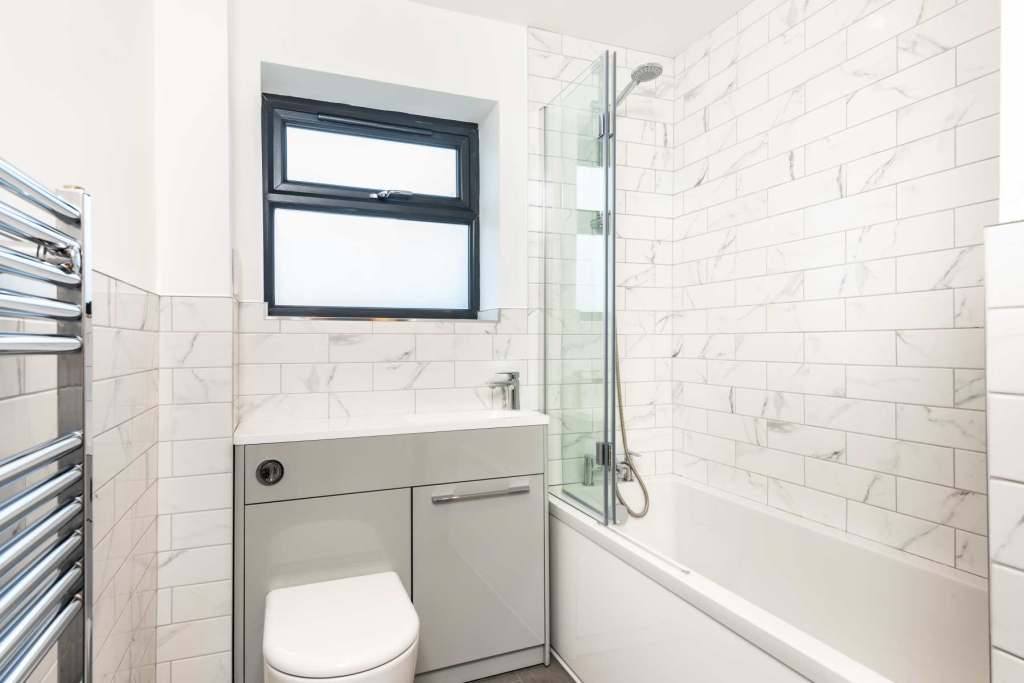 Elegantly designed modern bathroom with natural light